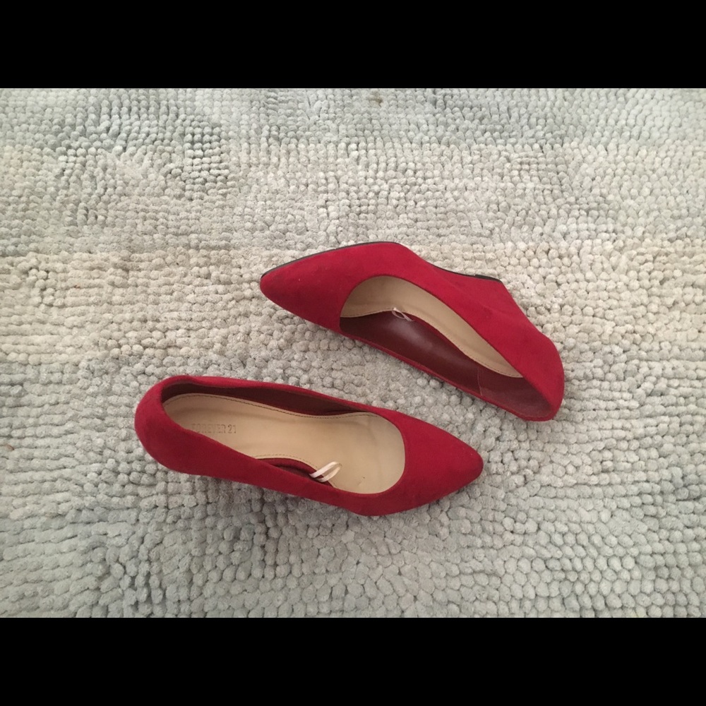 Suede red wedge pumps